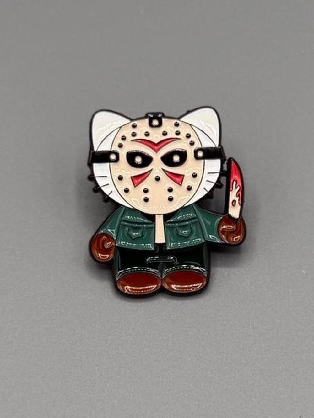 Horror Enamel Pin - Beige Mask, Green Jacket